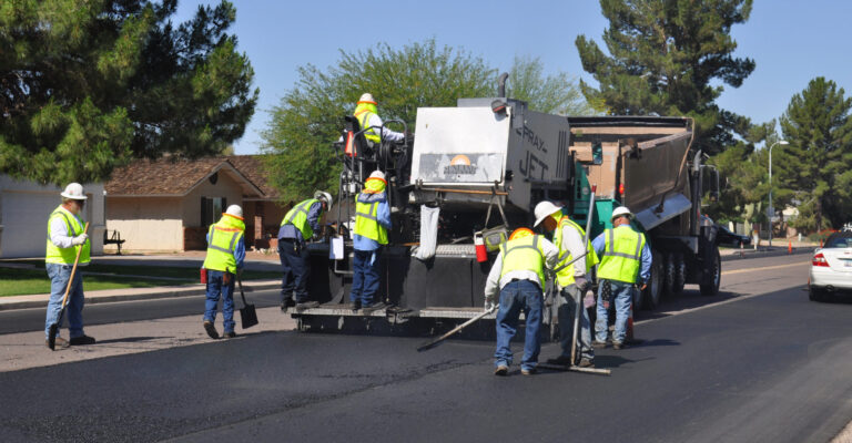Commercial asphalt paving crew at work
